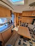Hobby 560 KMFE  Przyczepa Kempingowa Hobby 560 KMFE 6-osobowa z nowym namiotem