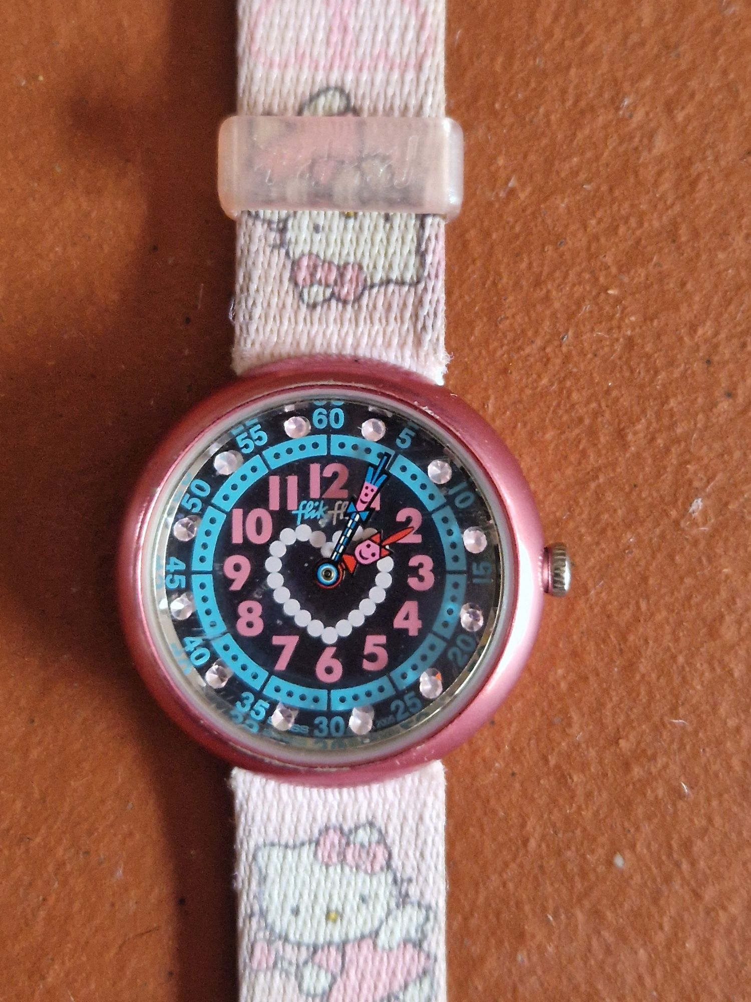 Óculos de sol e dois relógios de menina (Barbie e Flik Flak), 2005