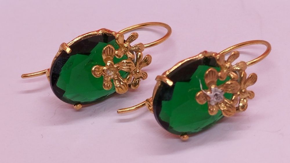 Brincos em prata dourada