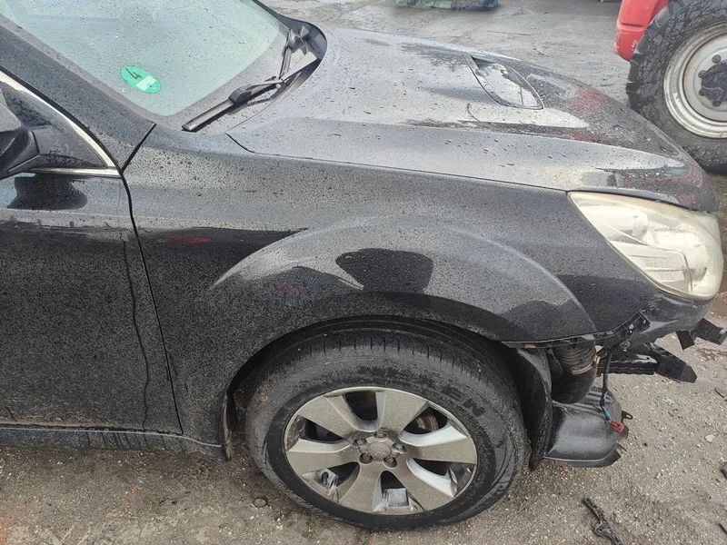 SUBARU LEGACY 10r BŁOTNIK PRAWY PRZÓD D4S