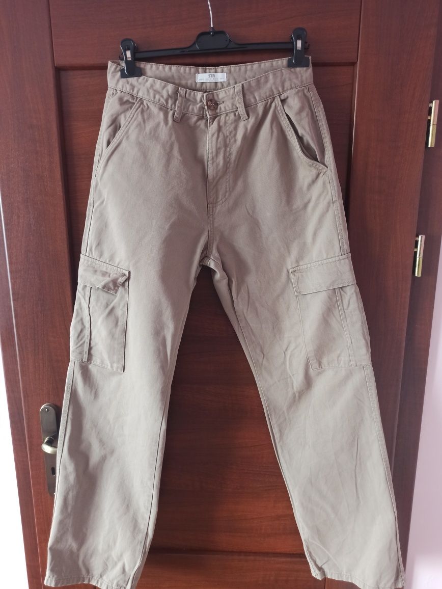 Brązowe spodnie jeansowe stradivarius roz 42