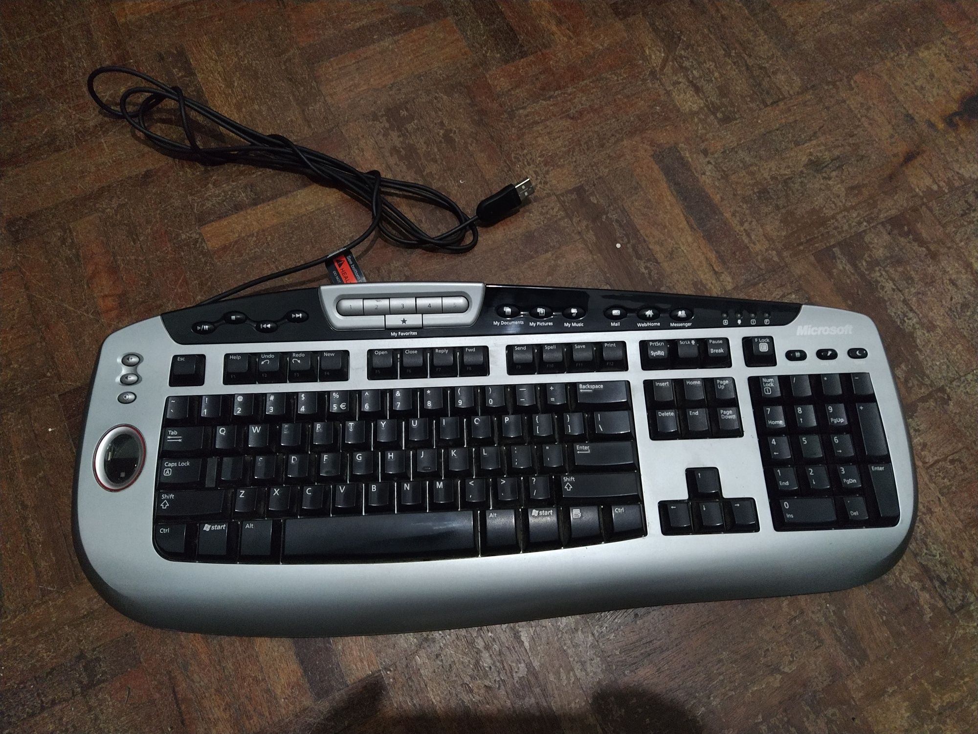 Teclado Microsoft com leitor biométrico layout US