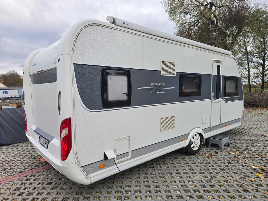 Przyczepa kempingowa HOBBY 545 KMF DeLuxe TRUMA salon polska faktura