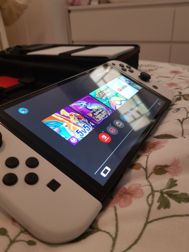 Nintendo Switch Oled como nova com garantia + mala + comando