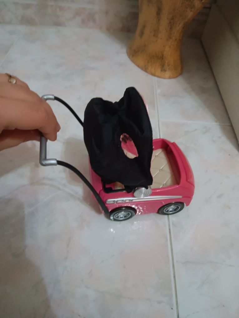 Carrinho de bonecas pequeno