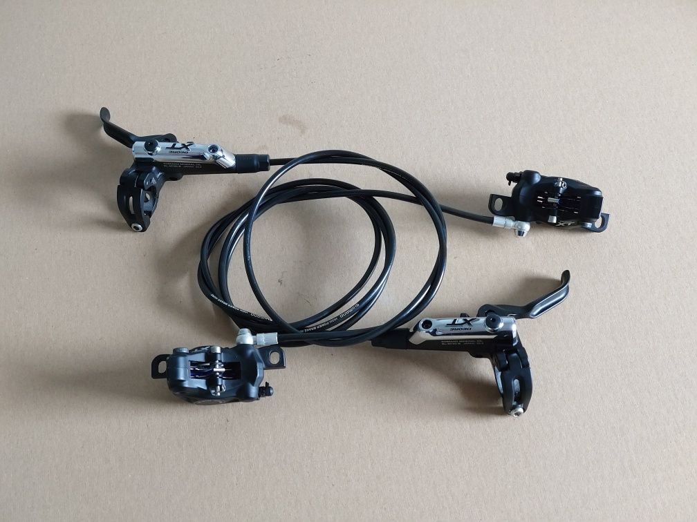 Hamulce hydrauliczne tarczowe Shimano Deore XT M785 komplet P+T