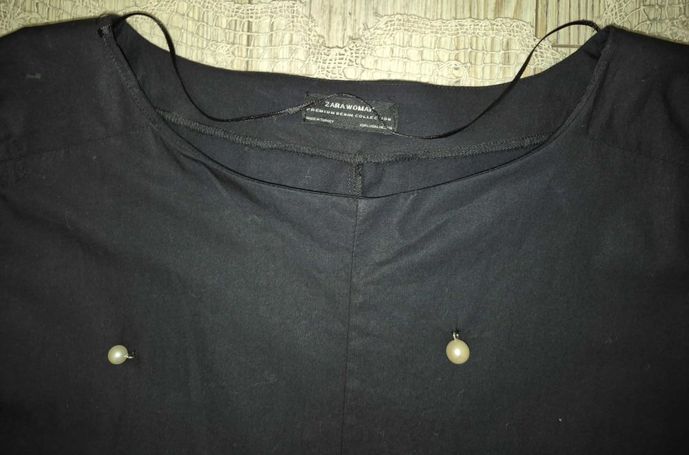 Оригінальна чорна блуза з намистинами