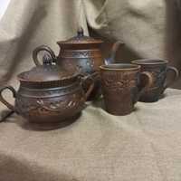 Глиняні чашки  та керамічні чашки різних об'ємів. Чайники та цукорниці