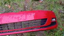 Vários para-choques originais de golf 7 de várias cores.