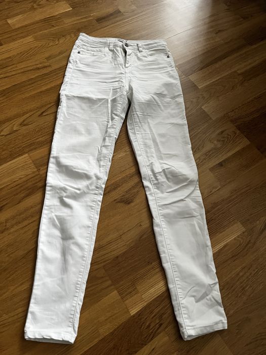 Białe jeansy Reserved r. 36