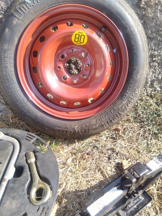 Pneu de emergência de Fiat Punto  1998