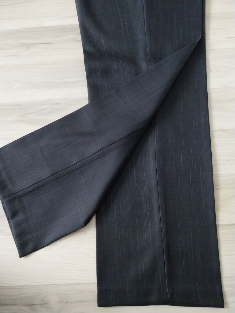 Nowe spodnie garniturowe proste szerokie nogawki 170