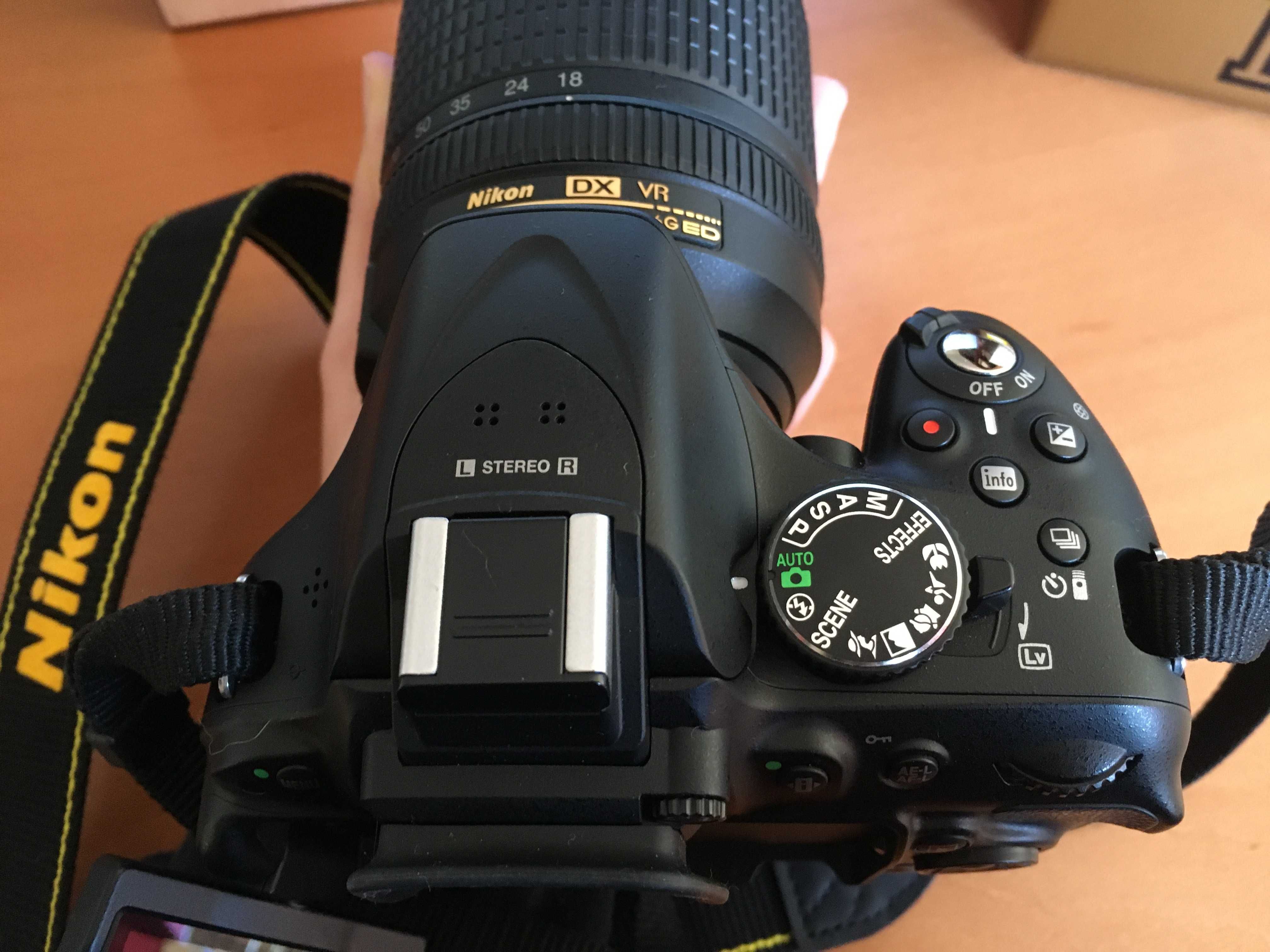 Nikon D5200 com objectiva 18-140 e acessórios