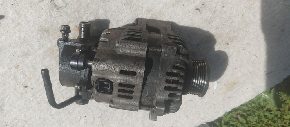 Alternator KIA CARENES 3