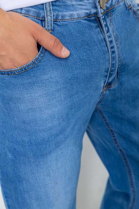 Джинси чоловічі з потертостями, колір блакитний