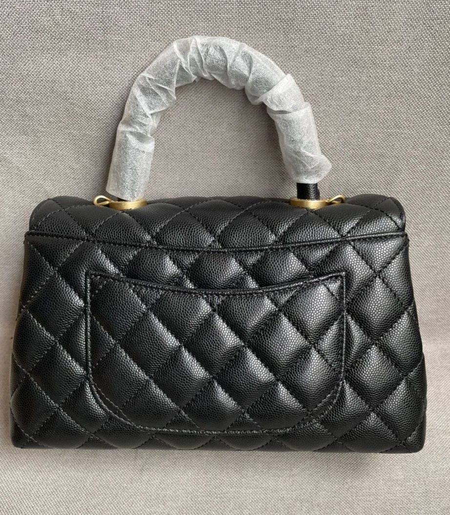 Chanel classic flap bag coco handle