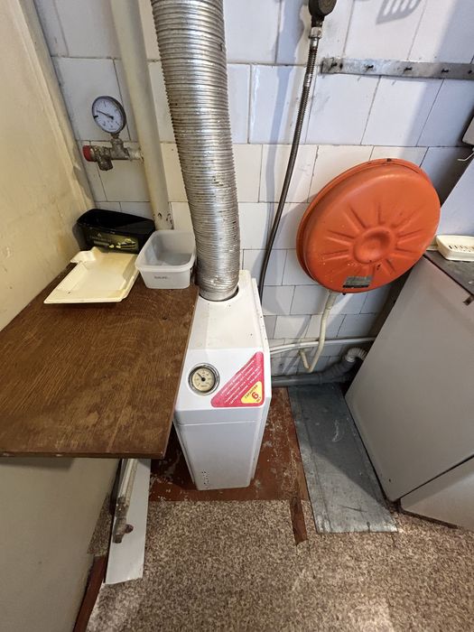 Центр, фасадна частина будинку по вулиці Юрка Тютюнника (Войкова)