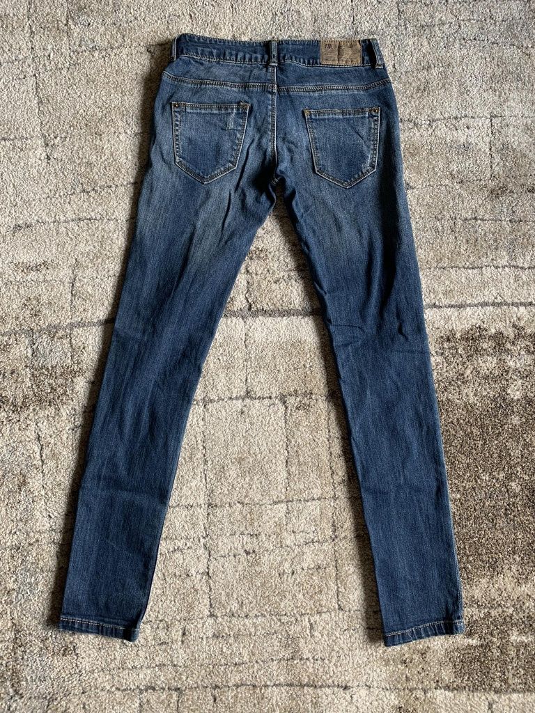 Jeansy spodnie jeansowe rurki z dziurami poszarpane przecierane Zara X