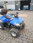 Quad 110 z kufrem
