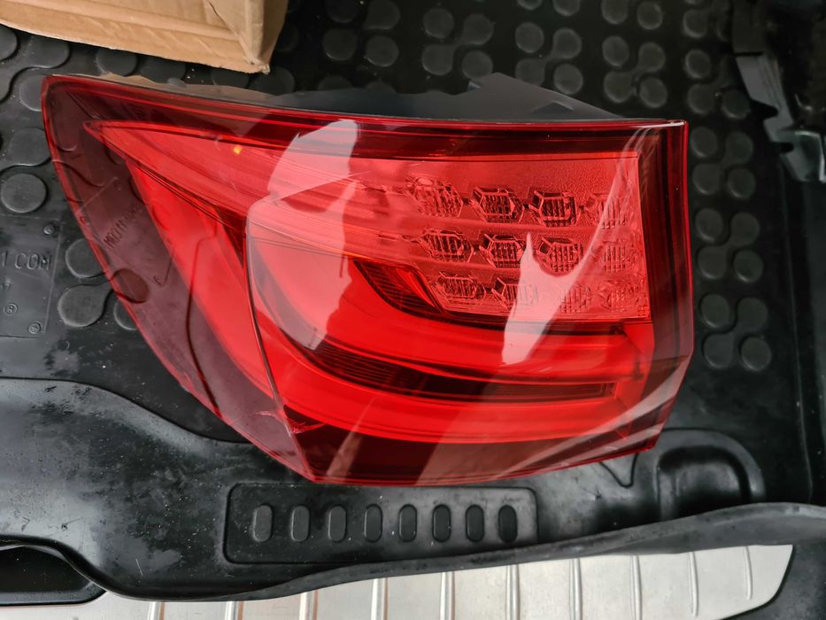 Lampa tył tylna BMW F11 w błotnik lewa przed lift EU