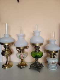 Cztery ozdobne lampy naftowe