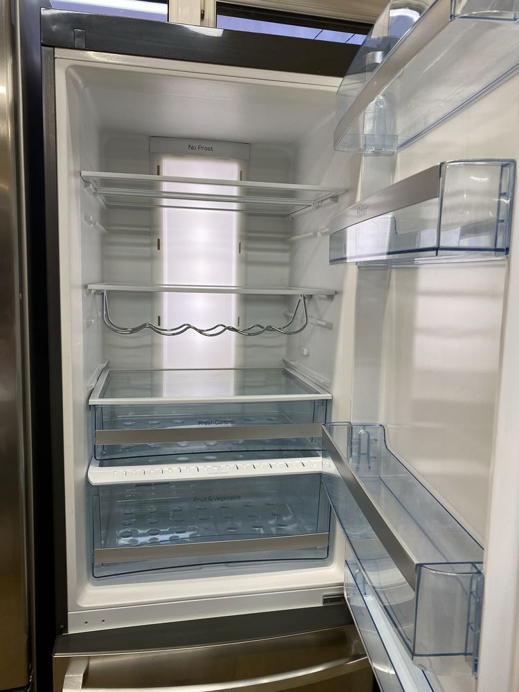 Холодильник фірми Haier, висотою 185 см, привезений з Німеччини