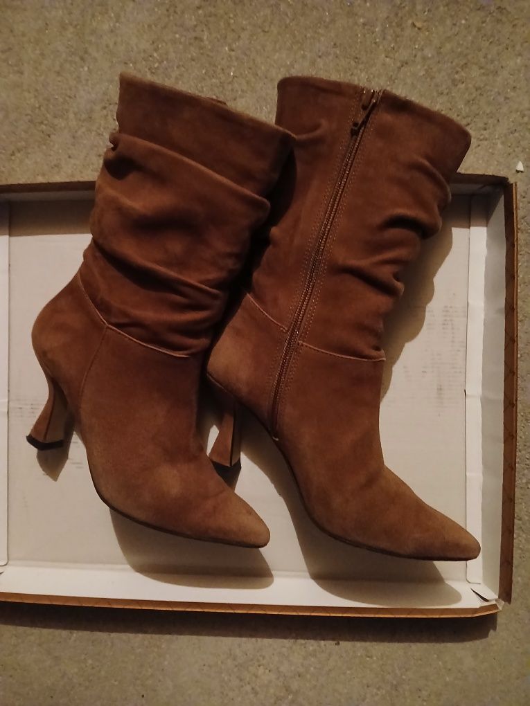 Botas cano médio