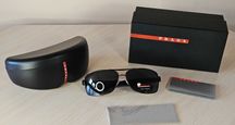 PRADA. Сонцезахисні окуляри PRADA SPS 54I 1BO-1A1 65 мм.