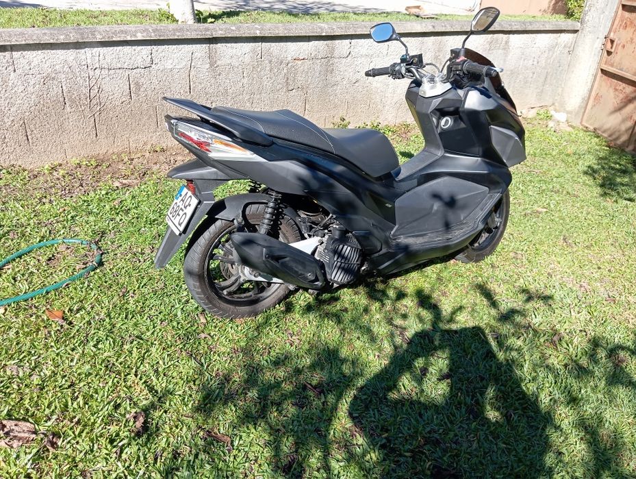 Sym jet x 125. Aquecimento a punhos