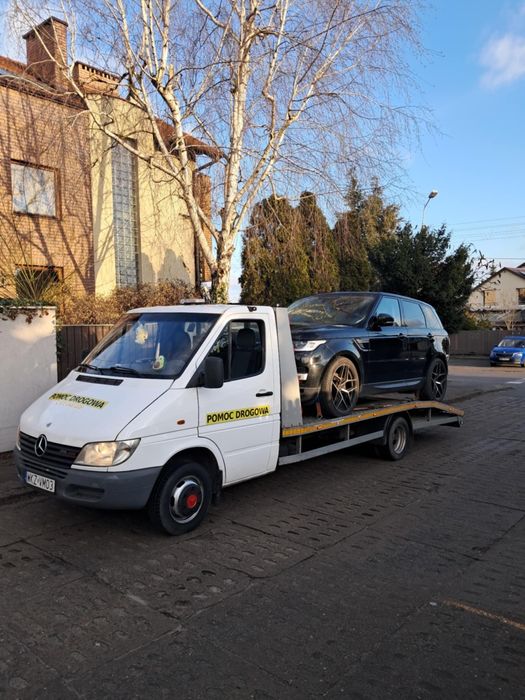 Pomoc drogowa autolaweta holowanie transport