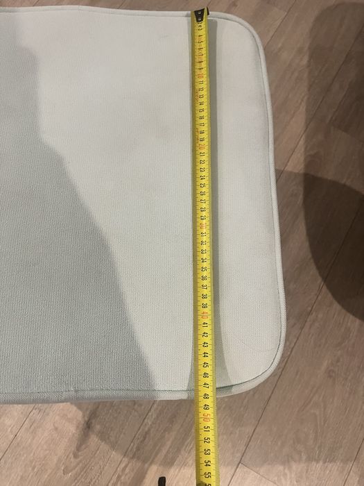 Fotel uszak z podnóżkiem miętowy