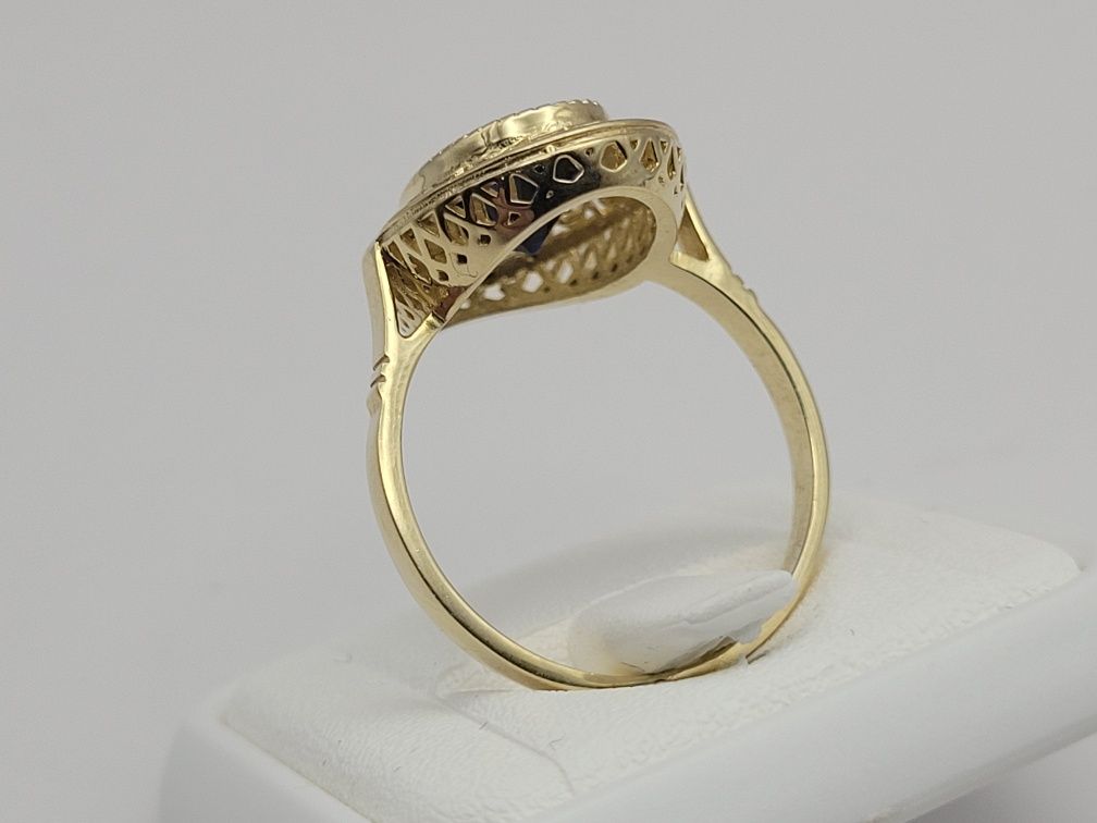 Nowy złoty pierścionek złoto próby 585, rozmiar 18 granatowa cyrkonia