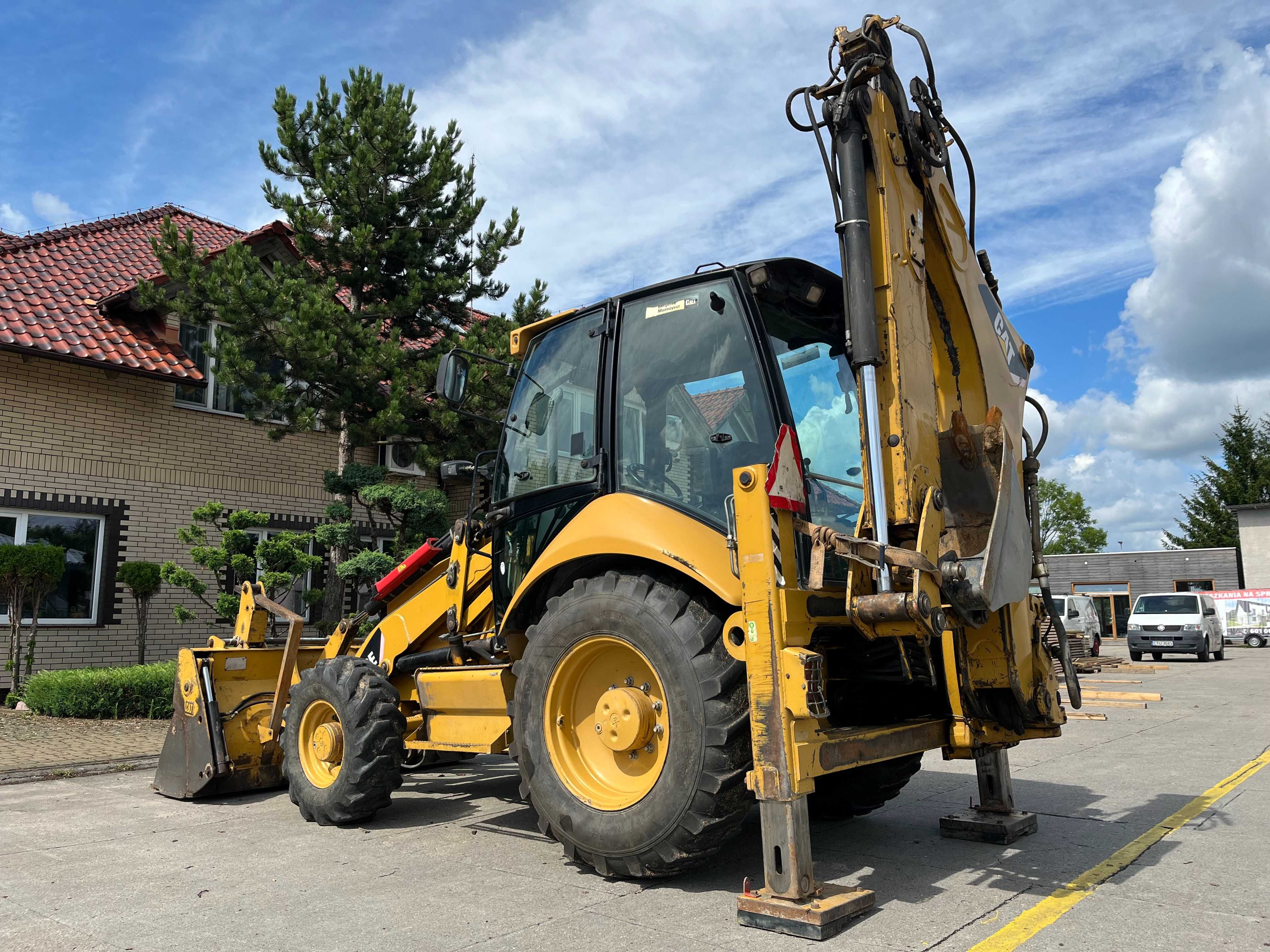 Koparko-ładowarka CATERPILLAR 428E/94KM-dodatkowo młot