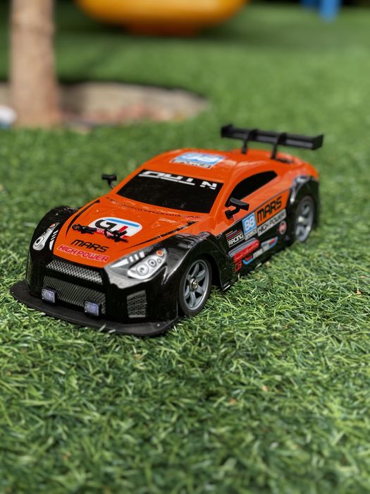 Дрифт машинка на радіокеруванні з димом Nissan 1:16 R/C Spray System