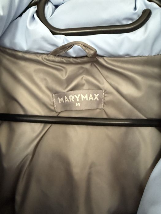 Жіночий пуховик розмір М