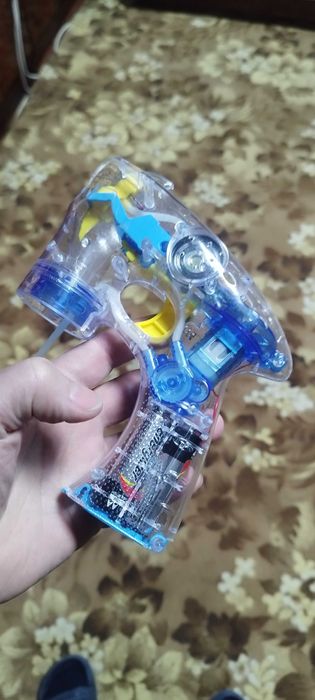 Пистолет для мыльных пузырей