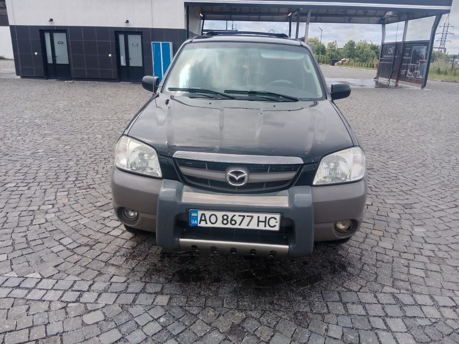 Мазда трибют повний привод
