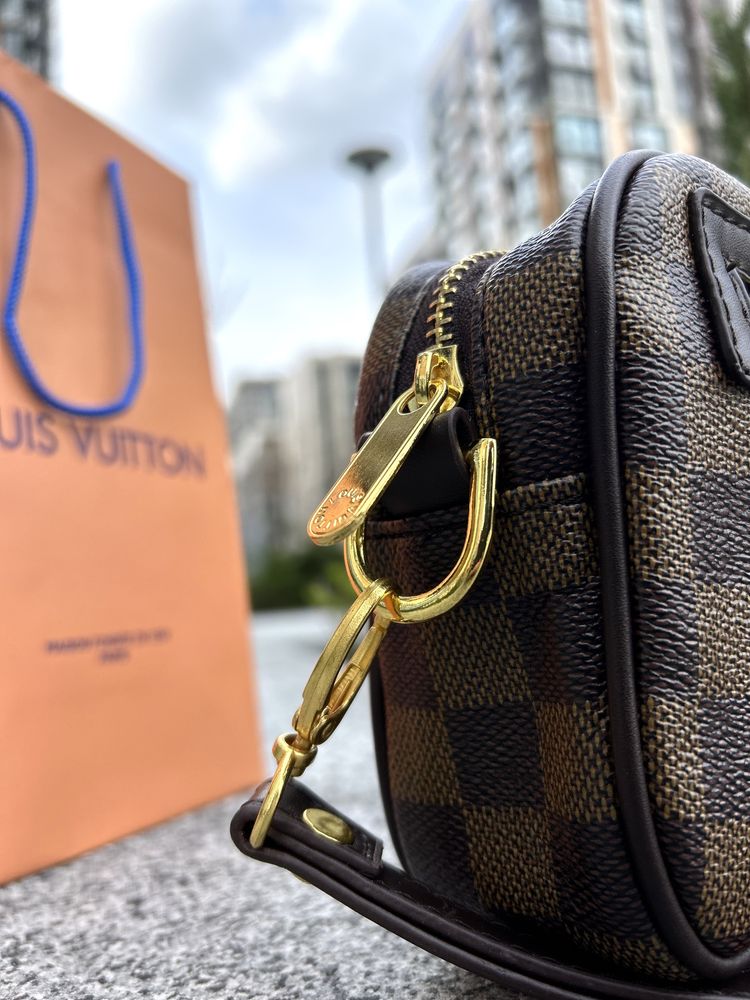 Клатч унісекс Louis Vuitton, який доповнить Ваш образ