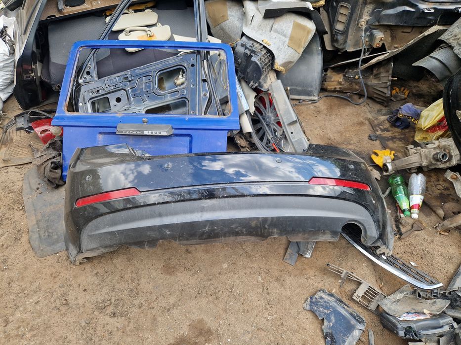 Задний бампер Geely Emgrand Хетчбек бампера Джили емгранд