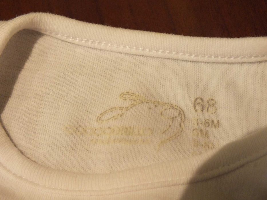 Śpioszki białe Coccodrillo roz. 68