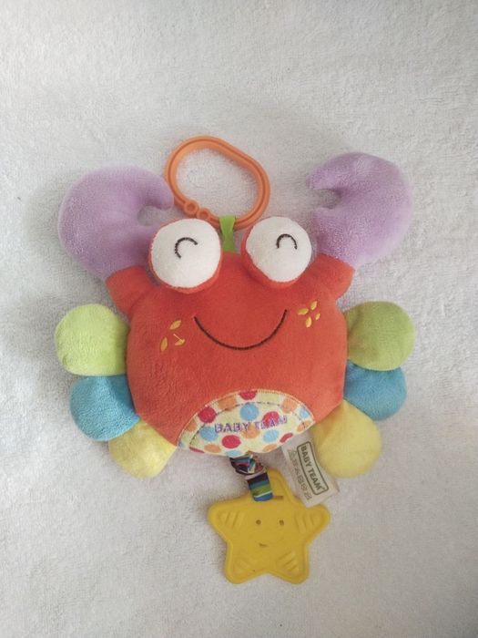 Іграшки на коляску