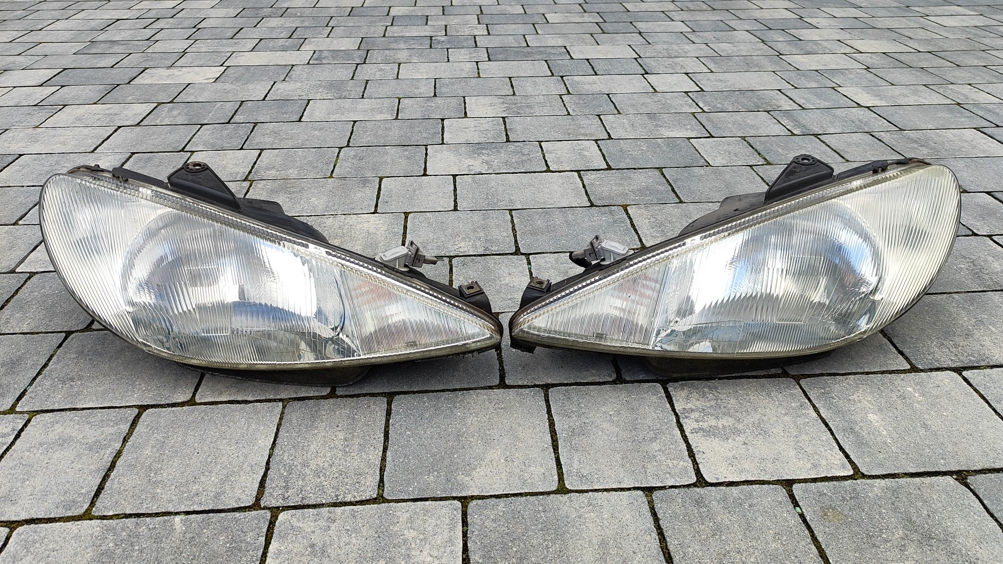 Lampy przednie przód Peugeot 206 Valeo Europa