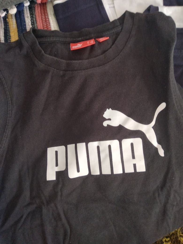 4 blusas sem mangas Puma vestidas 1 vez. N°14 anos.