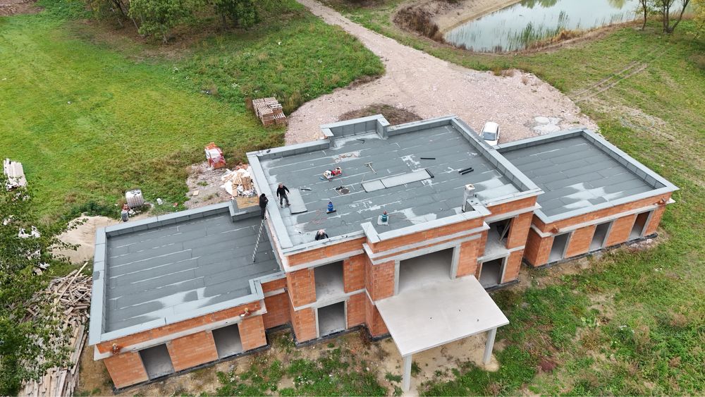 Dachy płaskie Tarasy Balkony Hydroizolacja Izolacja dachów Dekarz
