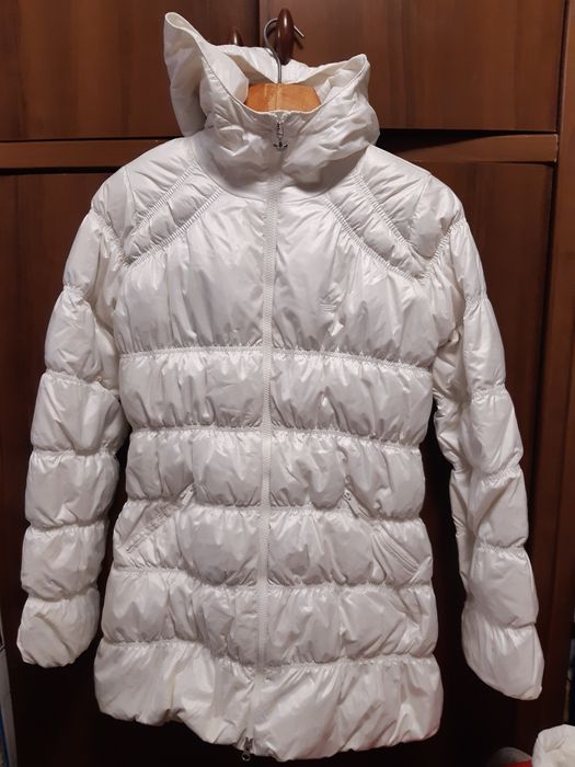 Женские пуховики.