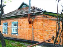 Цегляний будинок у Головачі.