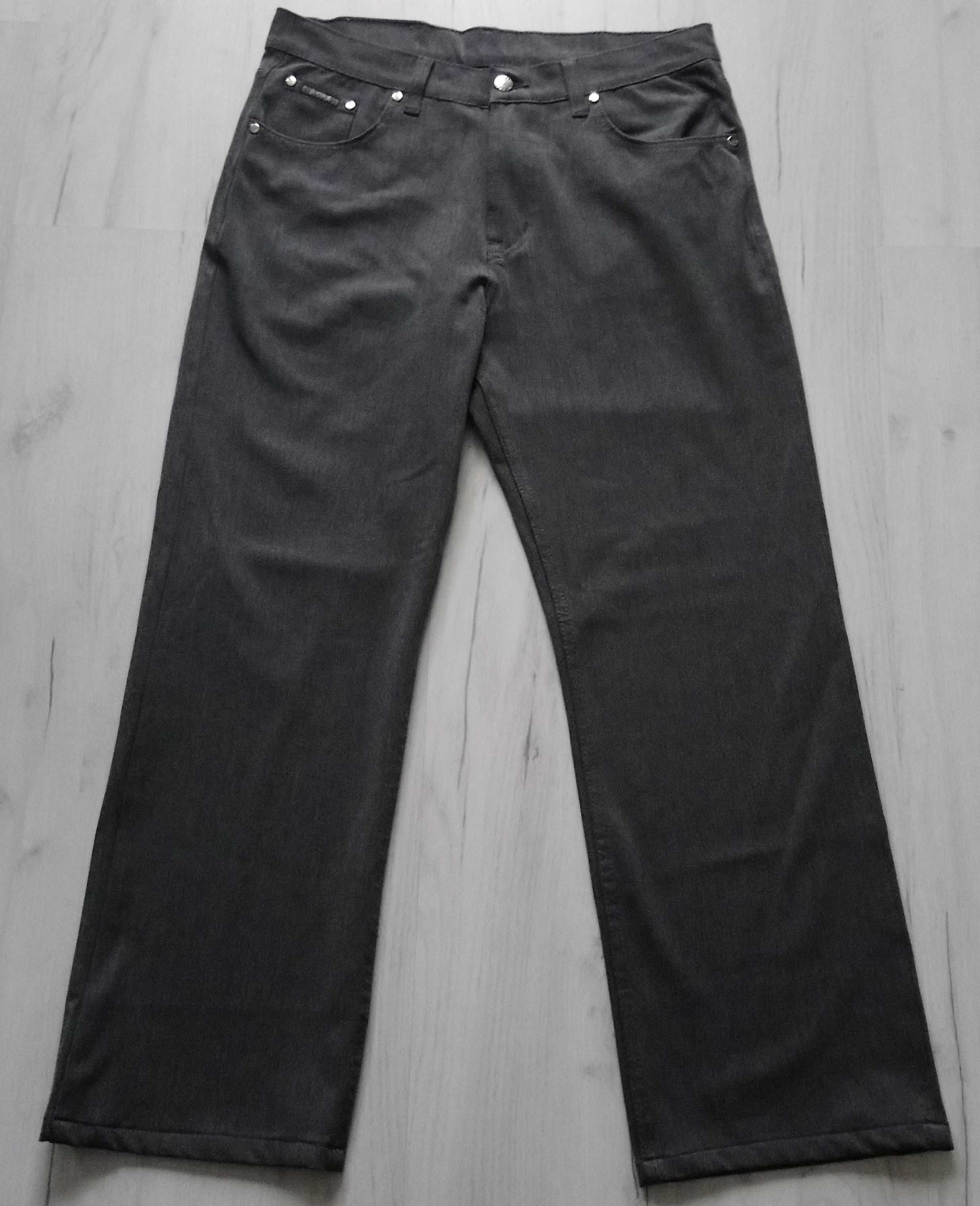 Eleganckie damskie spodnie materiałowe Hugo Boss rozmiar L W33