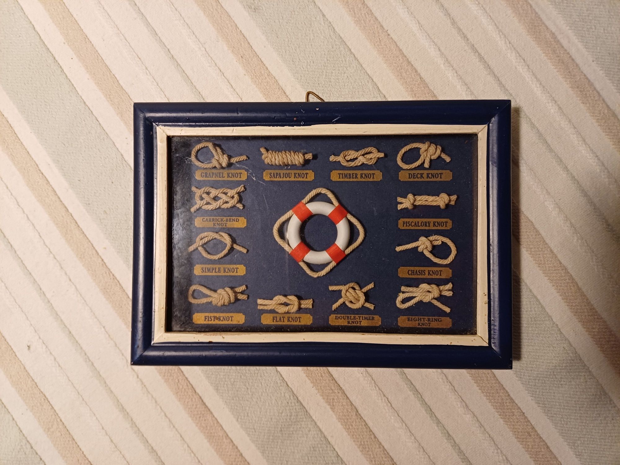 Quadro de nós de marinheiro com moldura azul