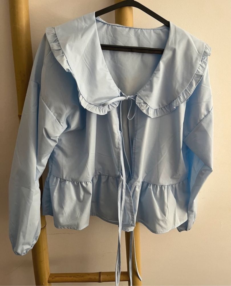 Blusa com folhos