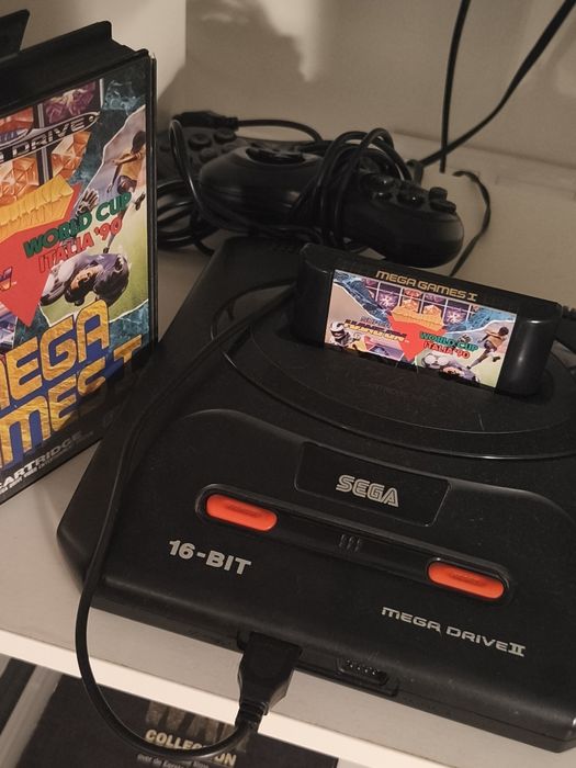 Mega drive, 2 comandos e 1  jogo